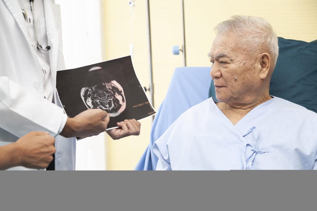 Doctor Explaining Brain Injury to Patient | Personal Injury Lawyers in NYC | Gash & Associates, P.C.