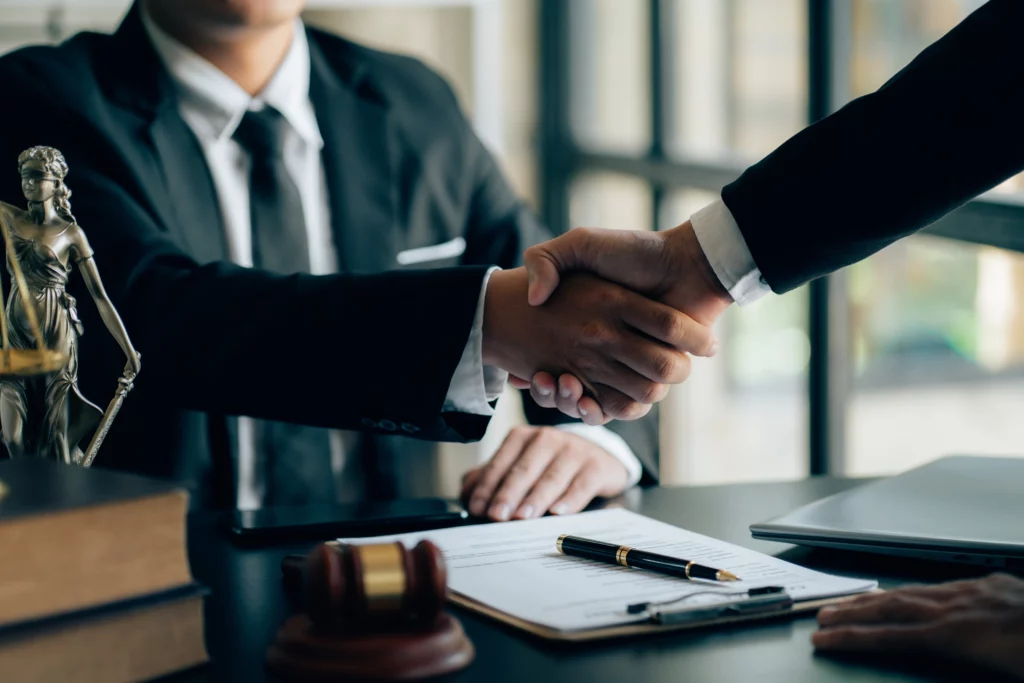 Businessman Shaking Hands with a Lawyer | Personal Injury Law Firm in NYC | Gash & Associates, P.C.