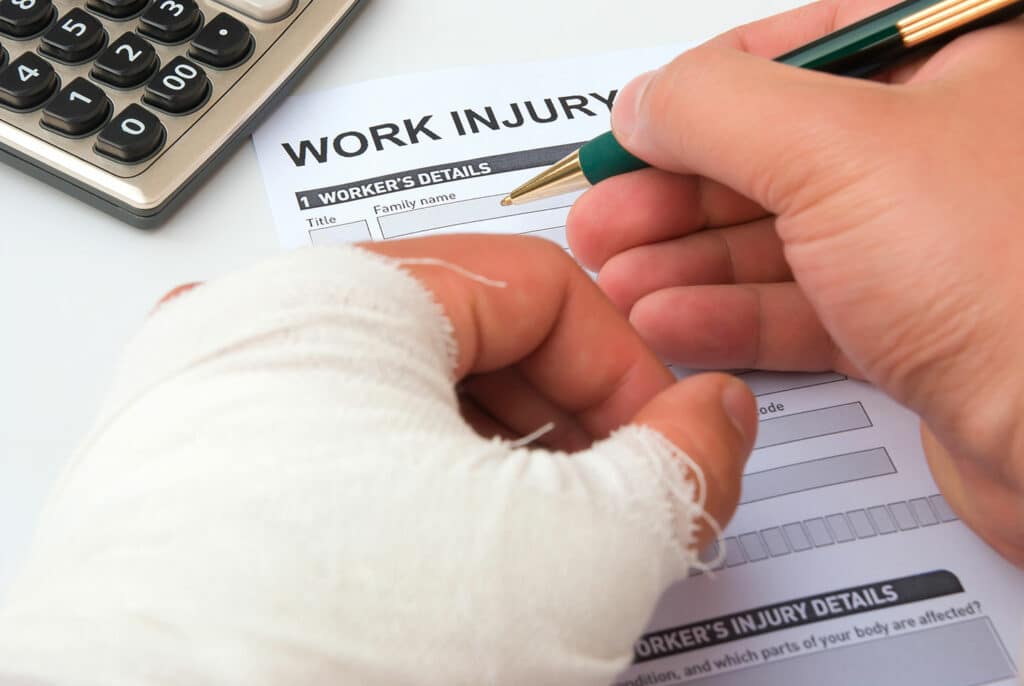 Injured Man Filing A Report | Workplace Injury Lawyers in New York City | Gash & Associates, P.C.