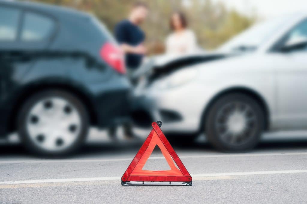 People Checking Damages After Car Crash | Motor Vehicle Accident Lawyers | Gash & Associates, P.C.