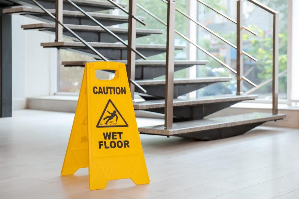 Caution Wet Floor Sign | Slip and Fall Accident Attorneys in NYC | Gash & Associates, P.C.