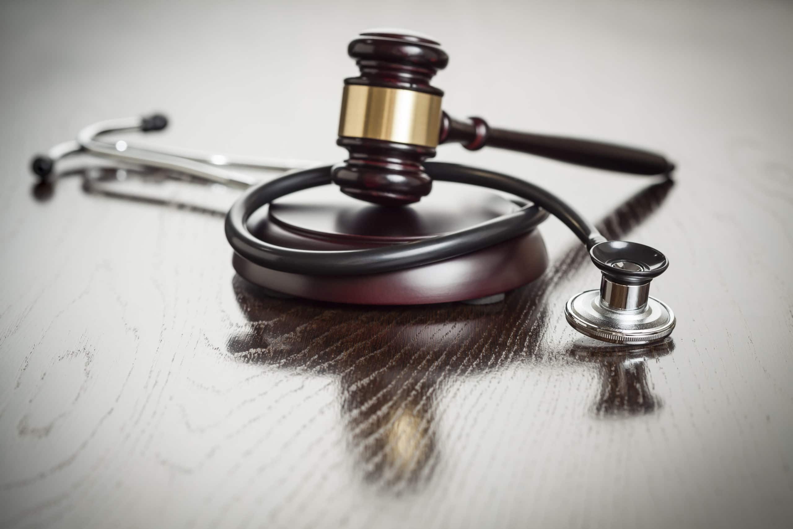 Gavel And Stethoscope On A Table | Medical Malpractice Lawyers in NYC | Gash & Associates, P.C.