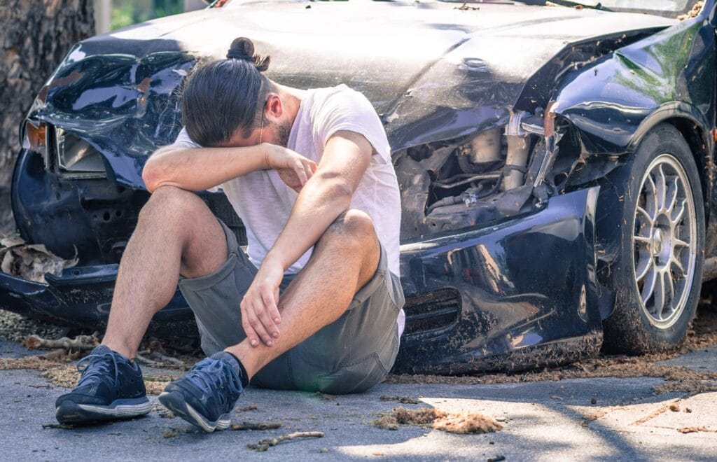 Man Crying After A Car Crash | Motor Vehicle Accident Lawyers in NYC | Gash & Associates, P.C.