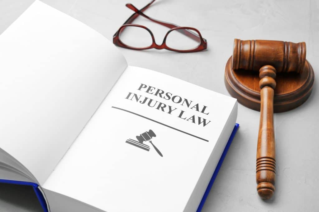 Judge Gavel With A Book | Personal Injury Lawyers in New York City | Gash & Associates, P.C.