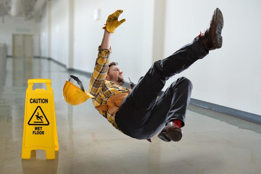 Man Worker Falling on the Ground | Slip and Fall Accident Attorneys in NYC | Gash & Associates, P.C.