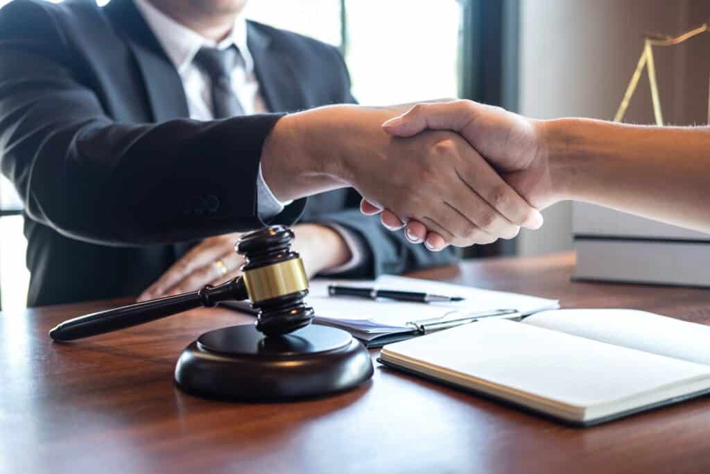 Experienced Lawyer Handshake With Client | Personal Injury Law Firm in NYC | Gash & Associates, P.C.