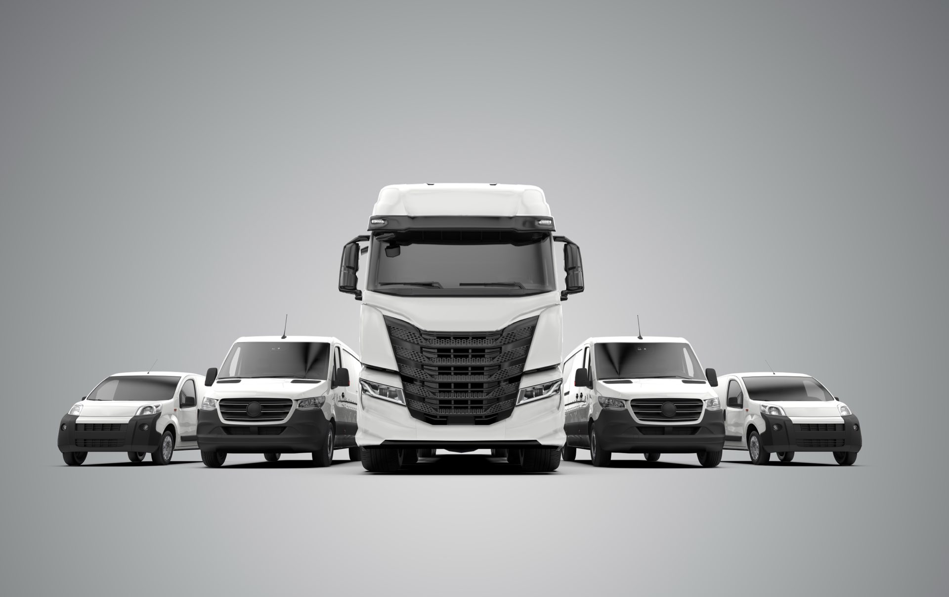 Grey background with five white commercial vehicles