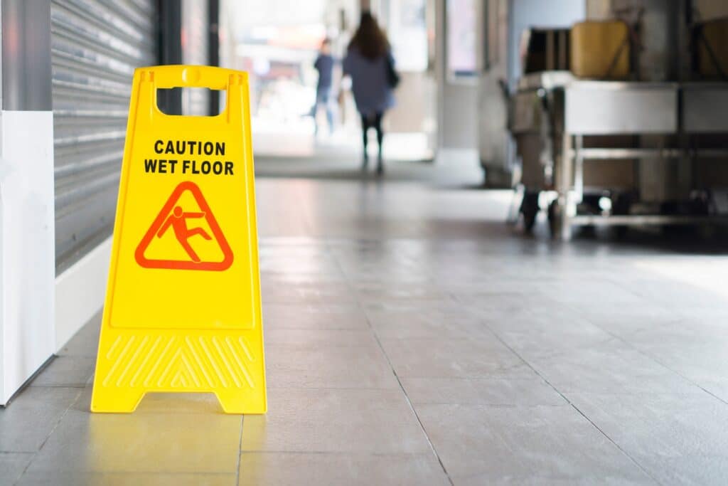 Yellow Sign Of Caution Wet Floor | Slip and Fall Accident Attorneys | Gash & Associates, P.C.