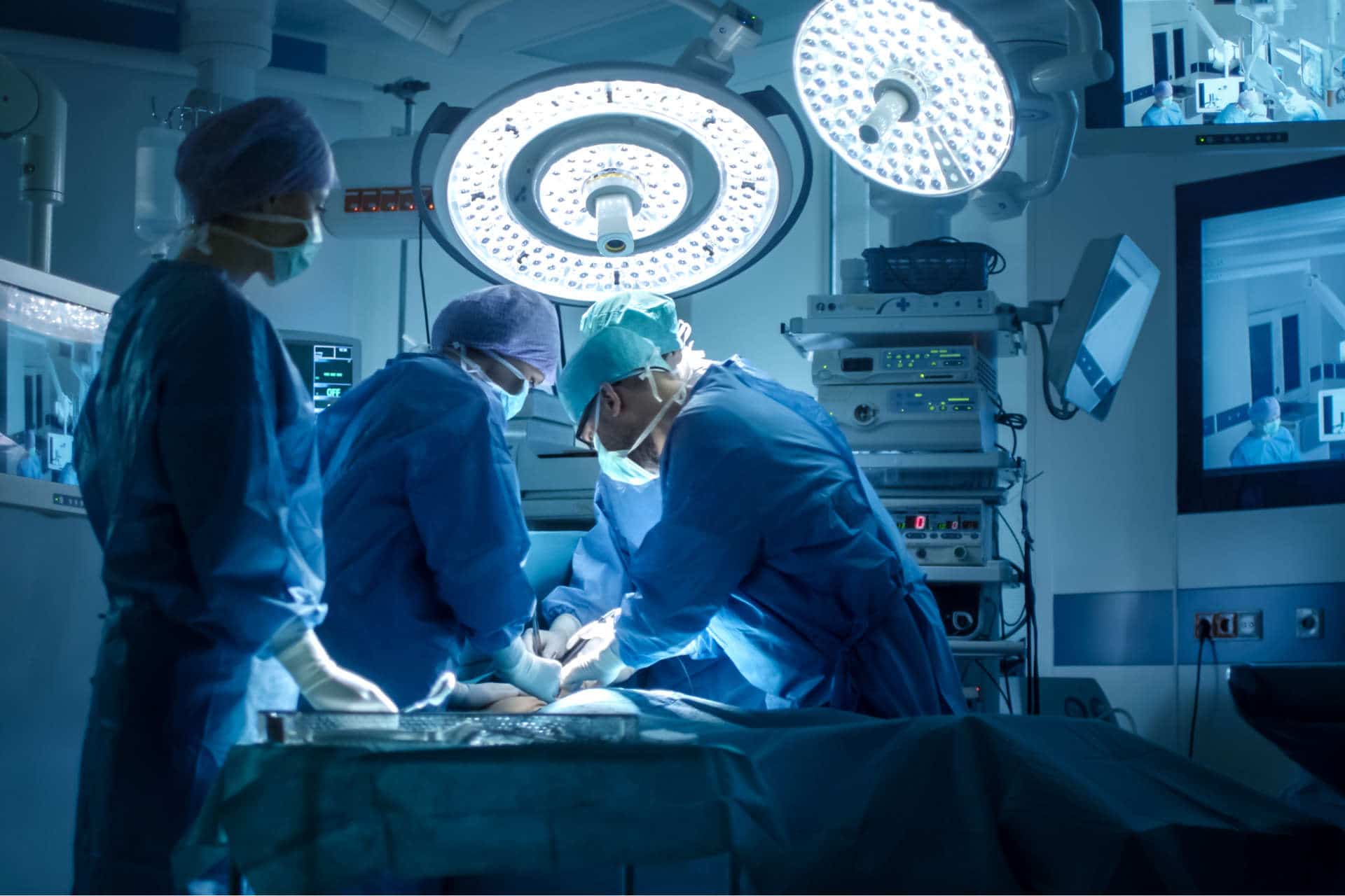 Medical team performing surgical operation | surgical malpractice lawyers | Gash & Associates, P.C.