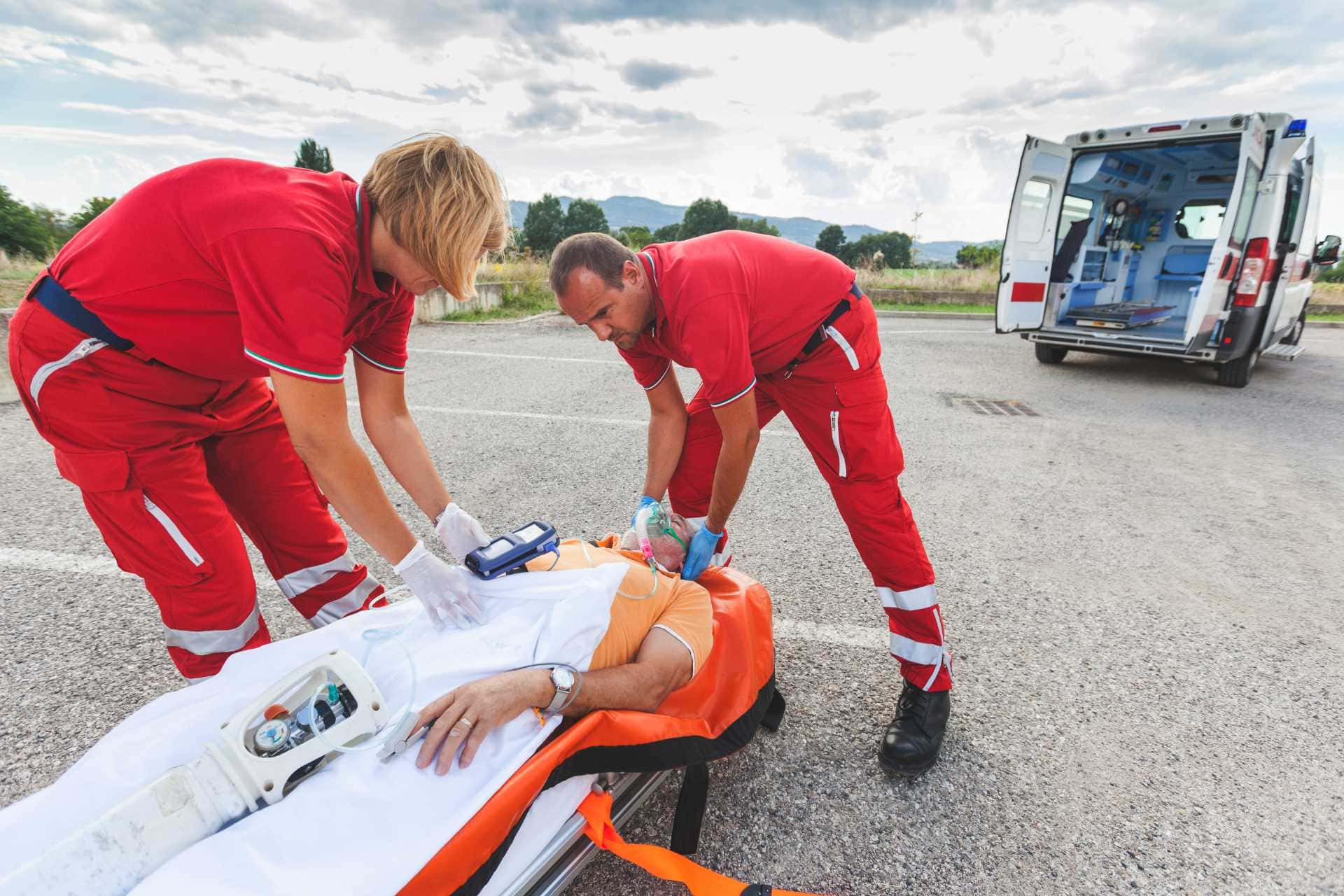 Rescue team providing first aid | trucking accidents lawyer in nyc | Gash & Associates, P.C.