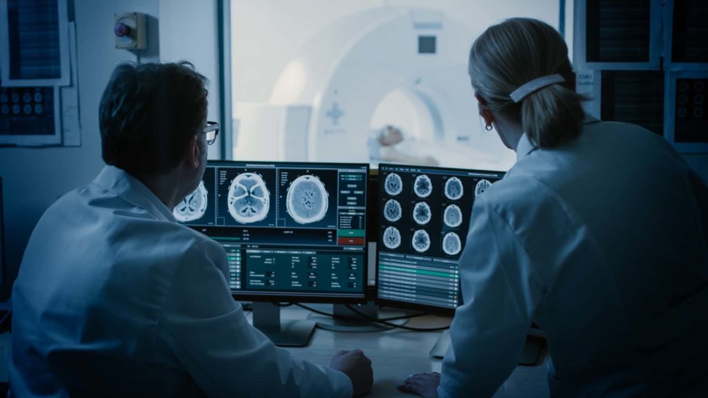 Doctors Monitor Brain Scans Results | Construction Accidents Lawyer in NYC | Gash & Associates, P.C.